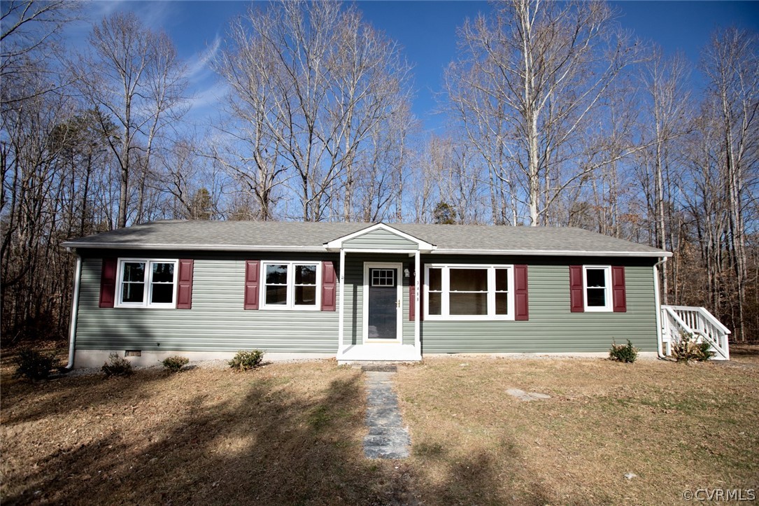 3488 Meherrin Road Meherrin, VA 23954 - Photo 3 of 50 a front view of a house with a yard and garage