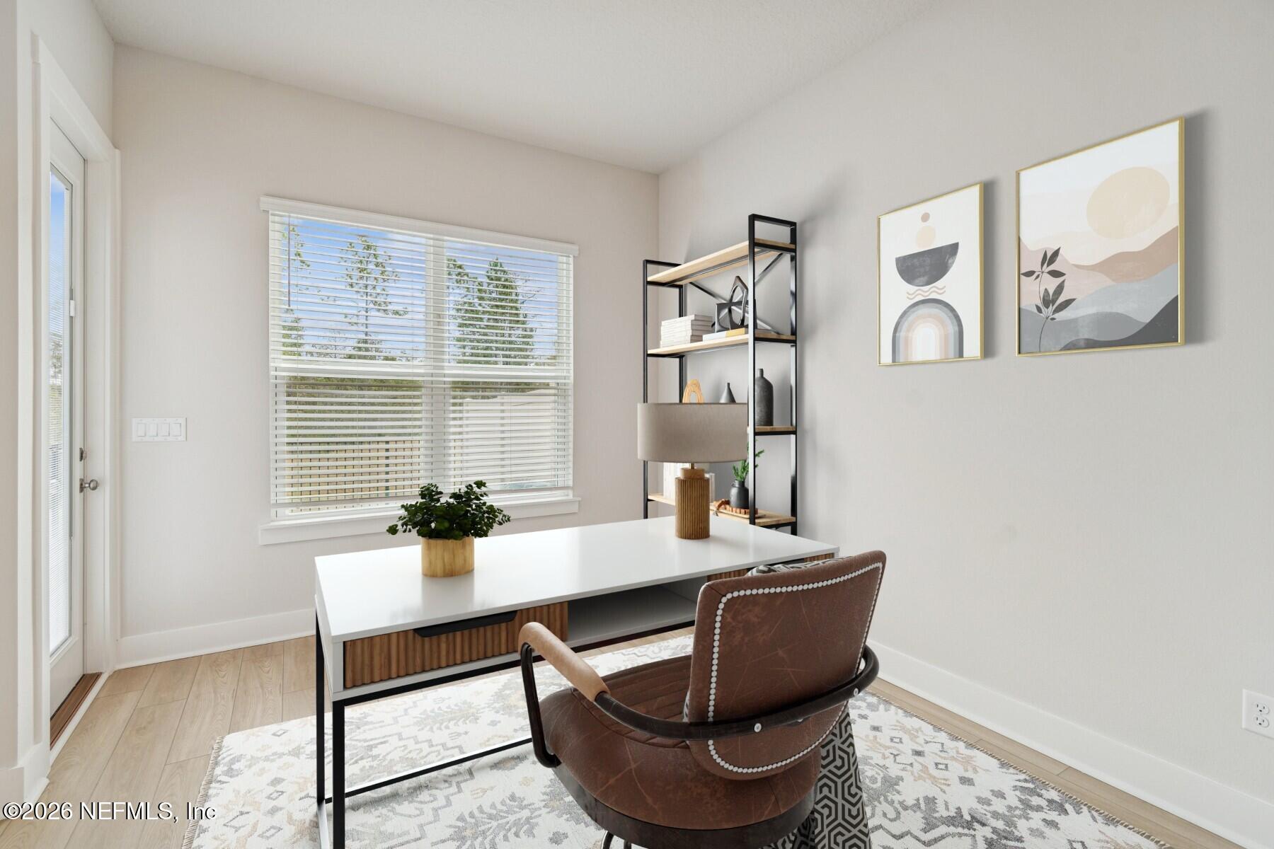 10131 Element Road Jacksonville, FL 32256 - Photo 12 of 28 a room with furniture and window