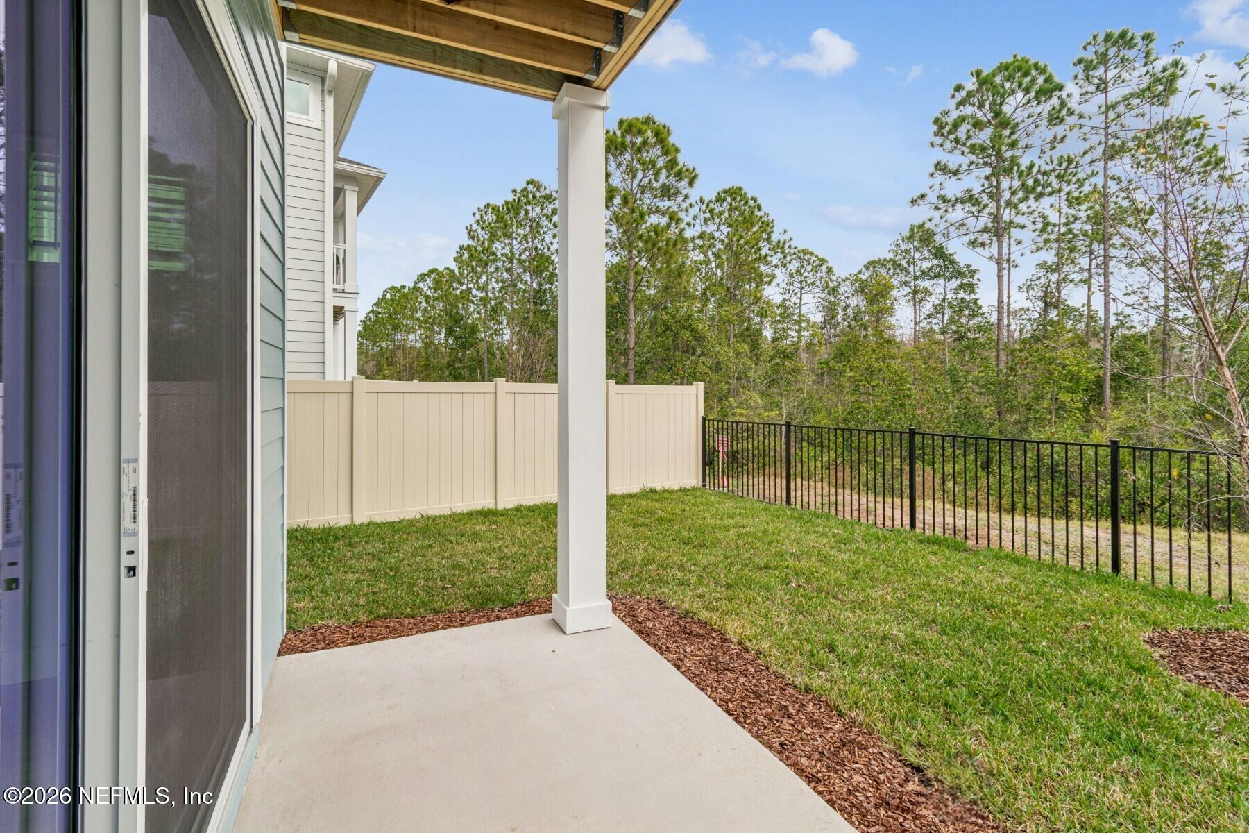 10131 Element Road Jacksonville, FL 32256 - Photo 27 of 28 a view of a back yard