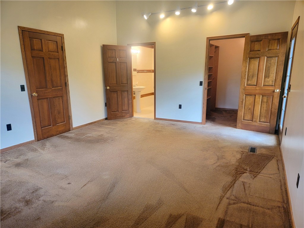 3855 Texas Hollow Road Hector, NY 14818 - Photo 25 of 50 First Floor En-Suite Bedroom With Full Bath
