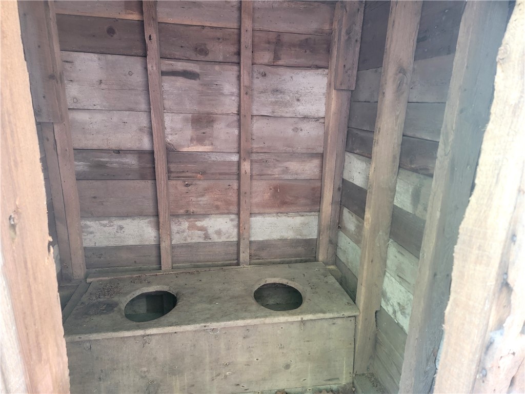 3855 Texas Hollow Road Hector, NY 14818 - Photo 46 of 50 Inside Original Outhouse
