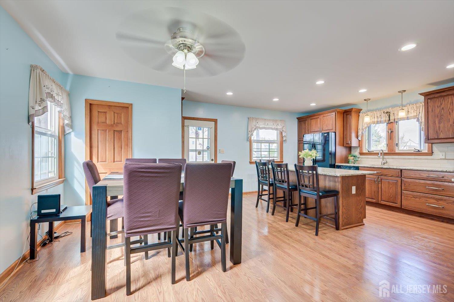 620 Dunellen Avenue Dunellen, NJ 08812 - Photo 11 of 48 a view of a dining room with furniture window and wooden floor
