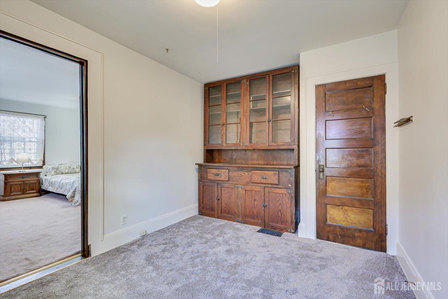 620 Dunellen Avenue Dunellen, NJ 08812 - Photo 25 of 48 a room with closet and cabinet