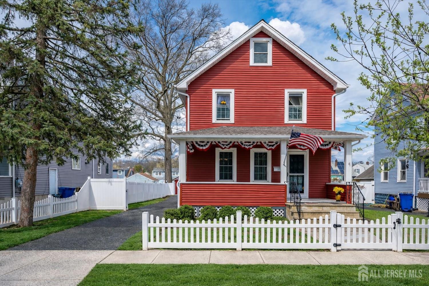 620 Dunellen Avenue Dunellen, NJ 08812 - Photo 3 of 48 front view of a house with a yard
