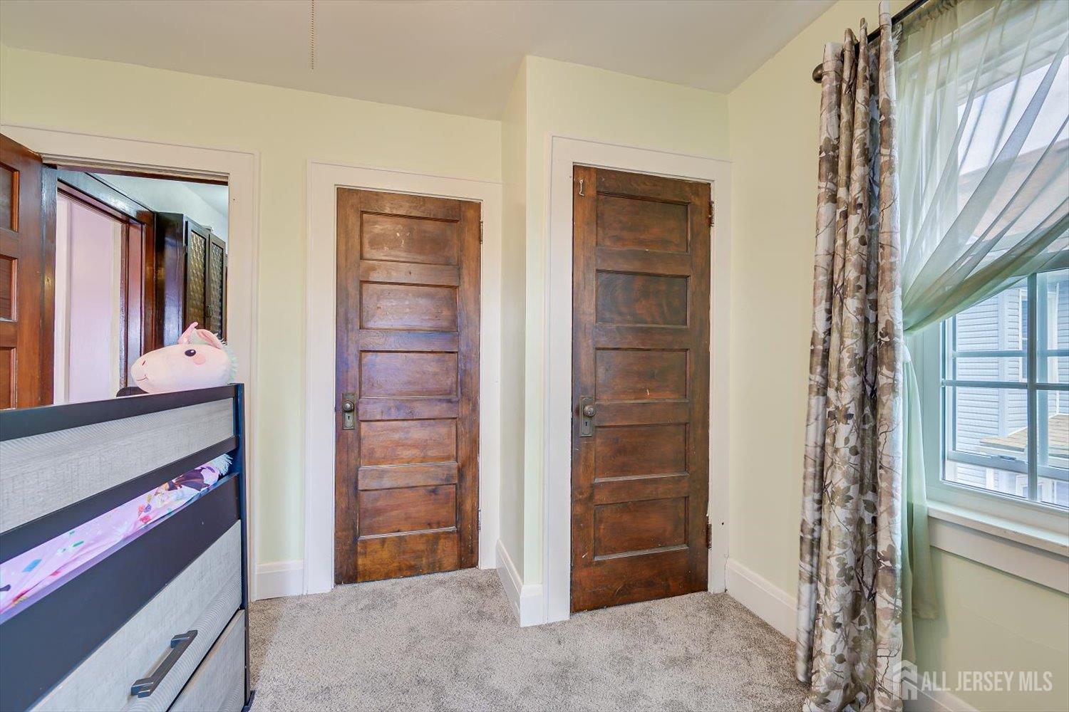 620 Dunellen Avenue Dunellen, NJ 08812 - Photo 31 of 48 a view of an empty room with cabinet and a window