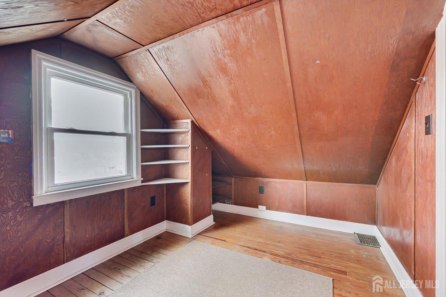 620 Dunellen Avenue Dunellen, NJ 08812 - Photo 33 of 48 a view of an empty room with a window