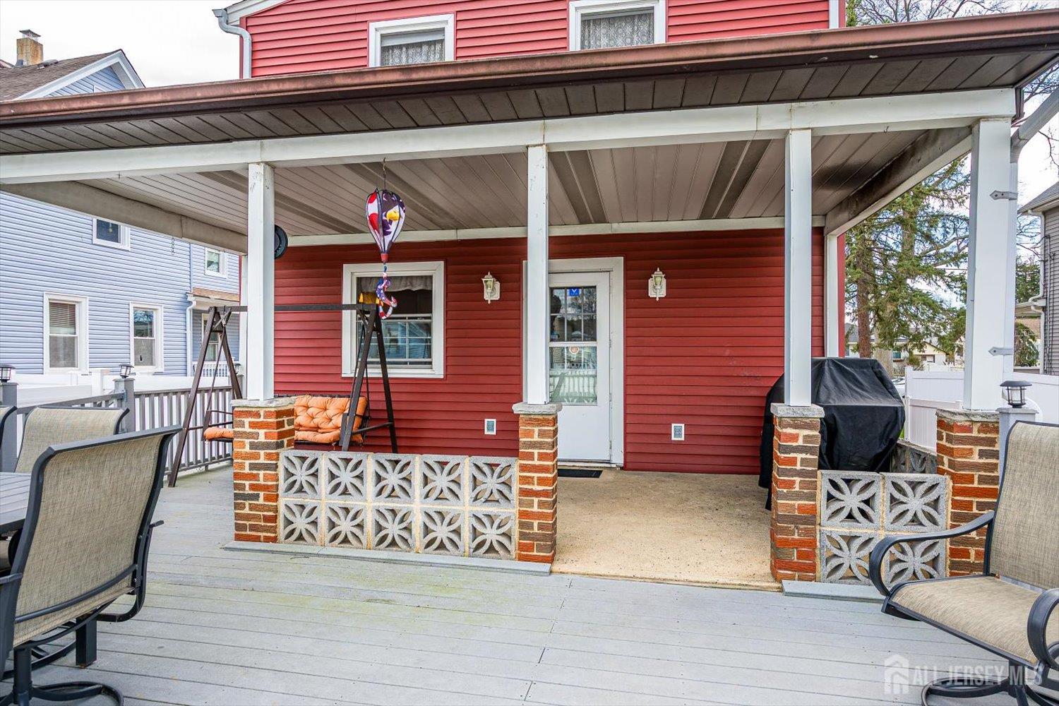 620 Dunellen Avenue Dunellen, NJ 08812 - Photo 41 of 48 a view of a chairs and a table in the patio