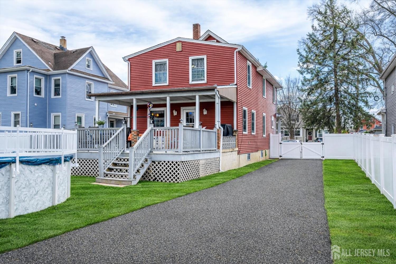 620 Dunellen Avenue Dunellen, NJ 08812 - Photo 42 of 48 a front view of a house with garden