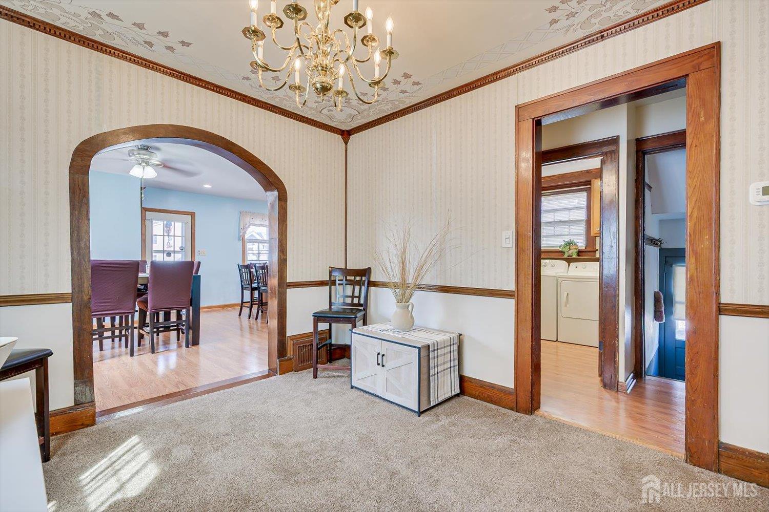 620 Dunellen Avenue Dunellen, NJ 08812 - Photo 9 of 48 a view of a livingroom with furniture and a chandelier