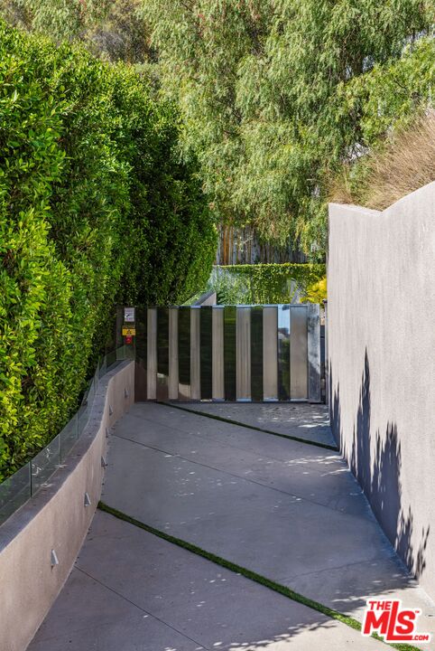 1895 Rising Glen Road Los Angeles, CA 90069 - Photo 3 of 41 a view of a black gate