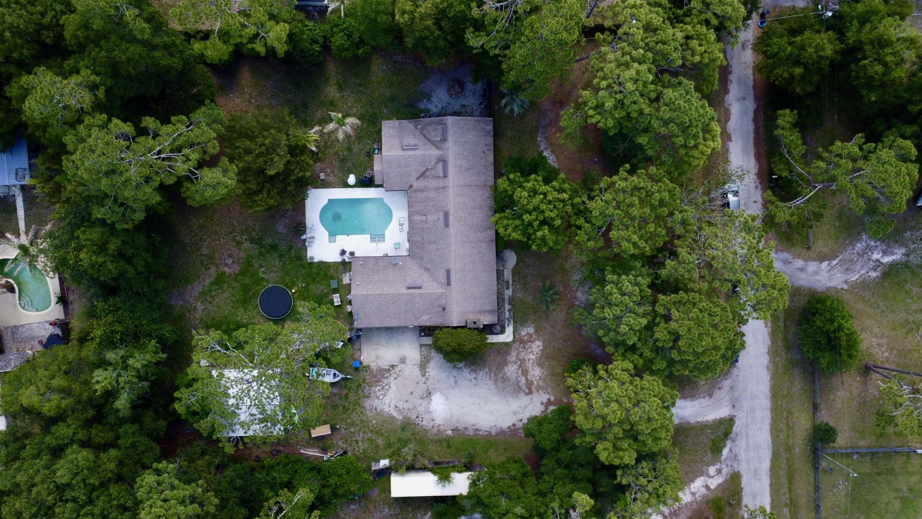 554 Hayley Road St. Augustine, FL 32086 - Photo 43 of 46 an aerial view of a house with outdoor space and a lake view