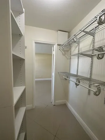 a view of a room with racks on the wall