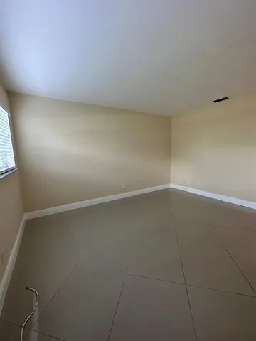 a view of a room with an empty space