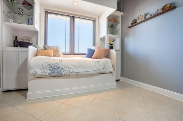 a balcony with chairs