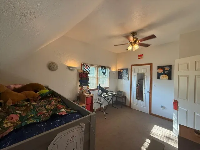 a front view of a house with parking space