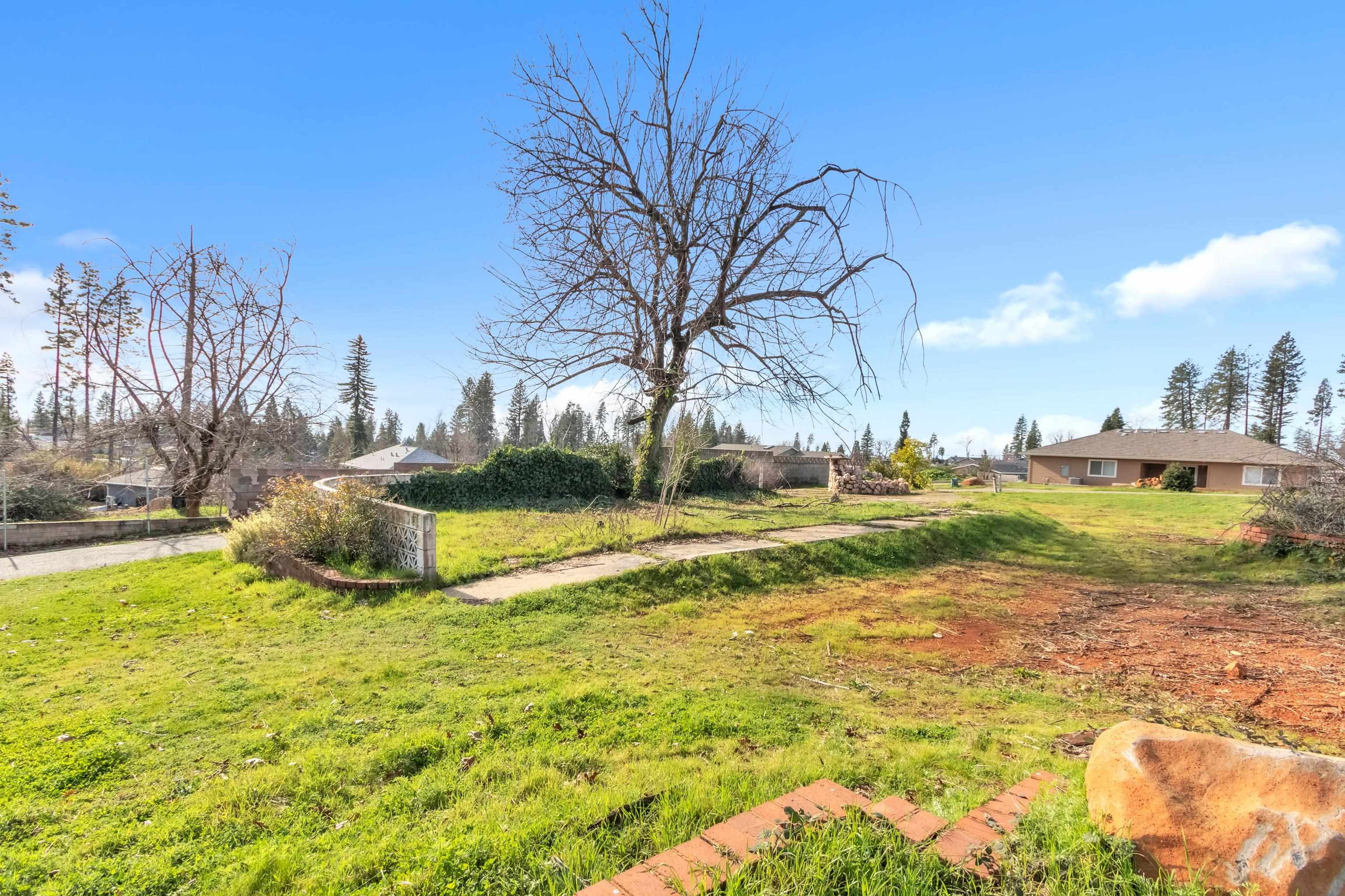 6251 Harvey Road Paradise, CA 95969 - Photo 37 of 48 a view of yard with swimming pool and green space