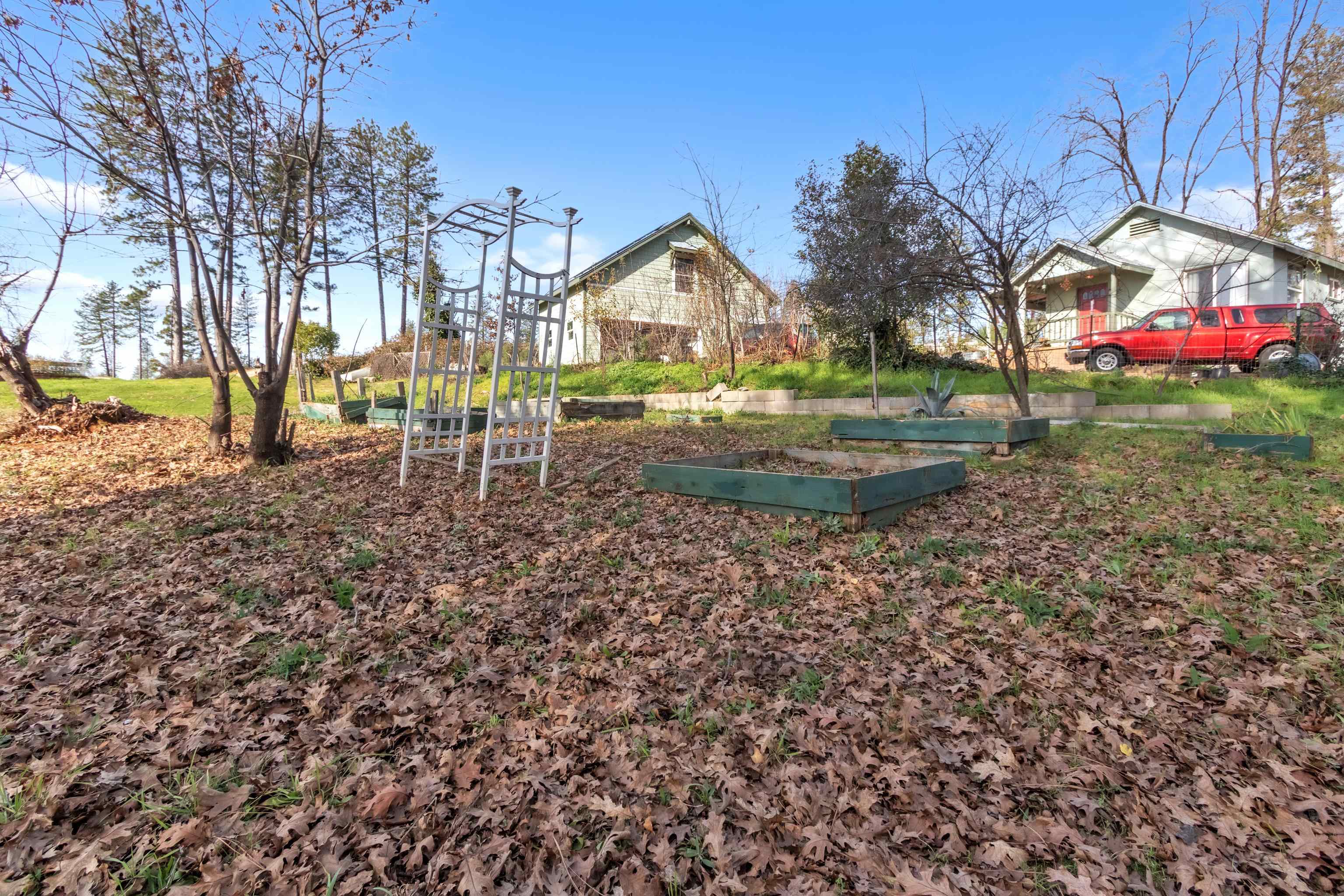 6251 Harvey Road Paradise, CA 95969 - Photo 38 of 48 a view of house with backyard and trees