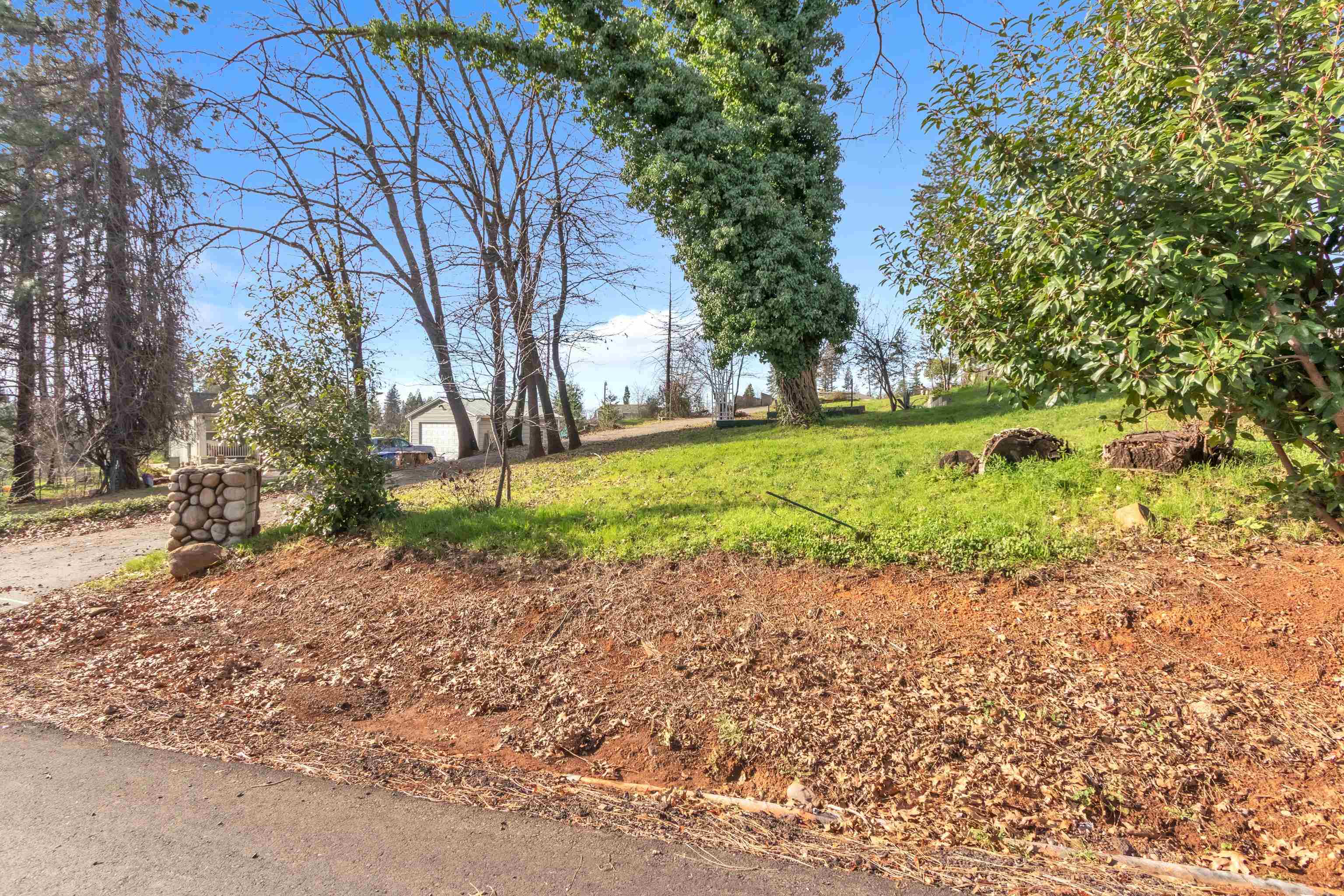 6251 Harvey Road Paradise, CA 95969 - Photo 47 of 48 a backyard of a house with green space