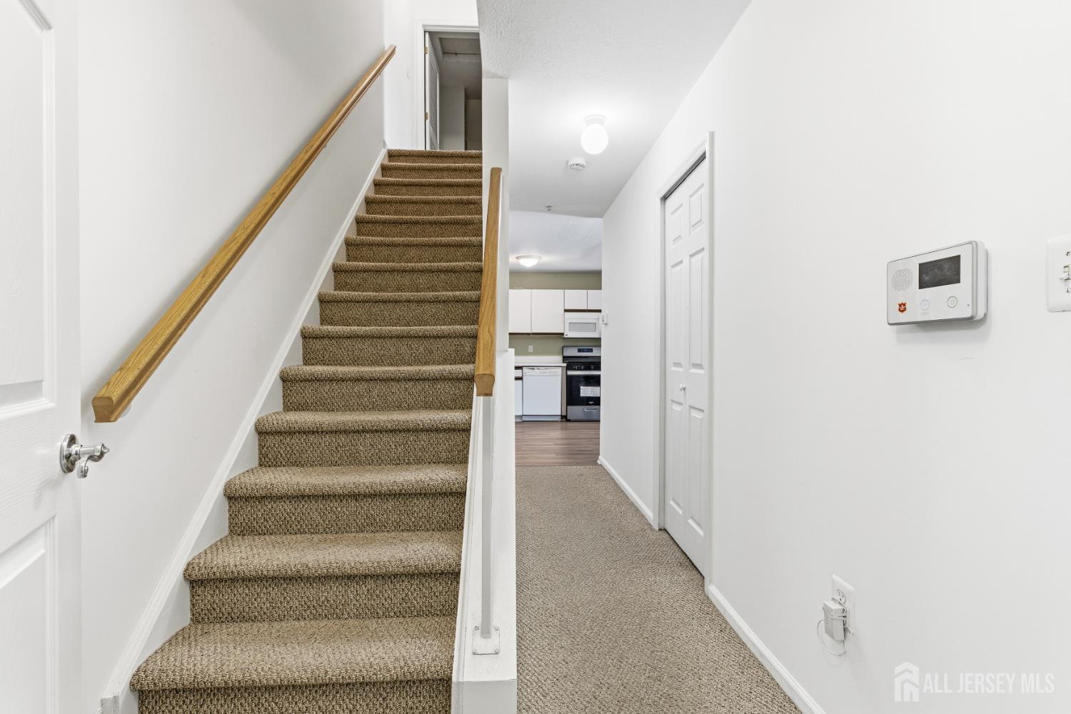 21 Newburgh Drive Edison, NJ 08820 - Photo 12 of 31 a view of staircase with white walls