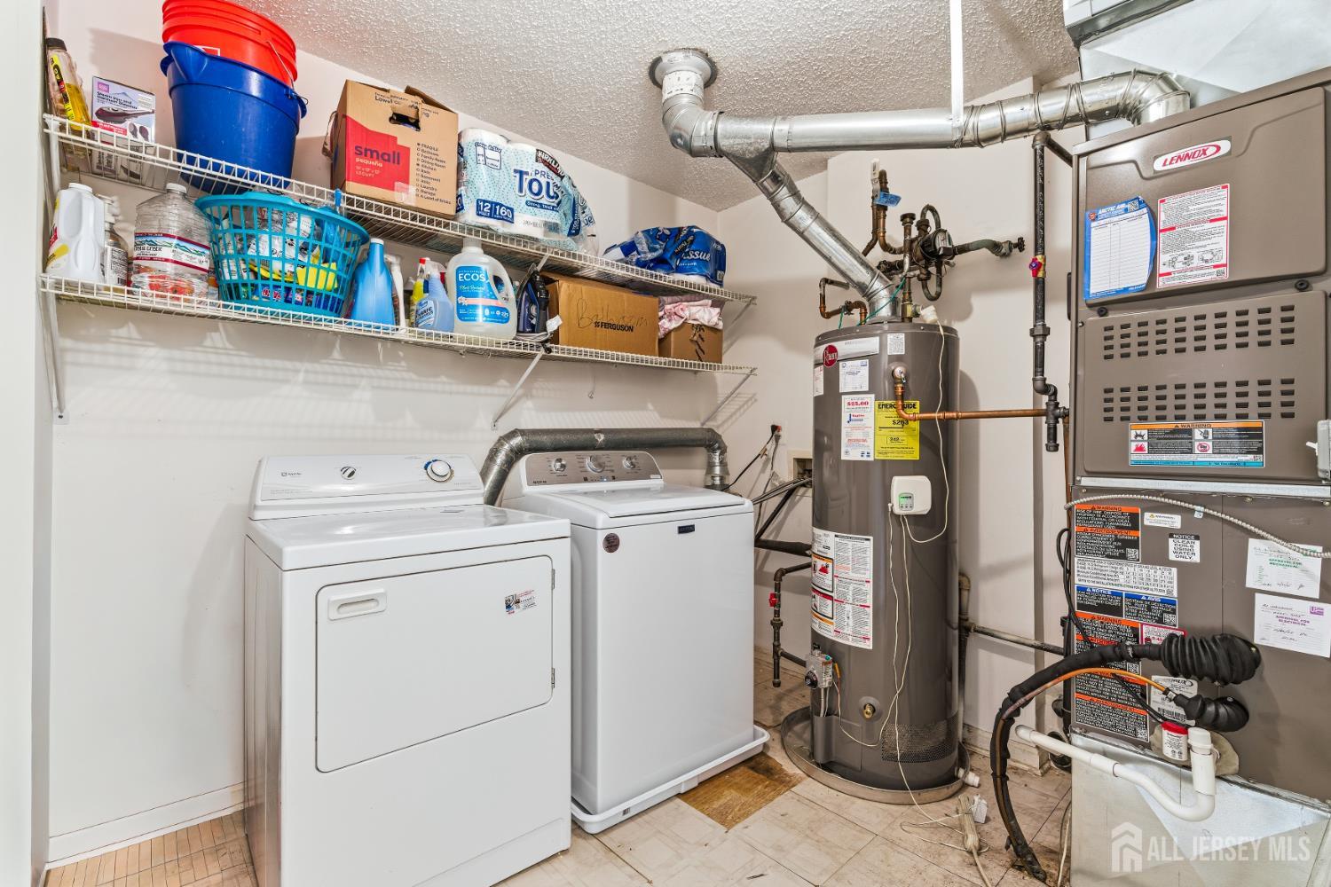 21 Newburgh Drive Edison, NJ 08820 - Photo 22 of 31 a utility room with dryer and washer