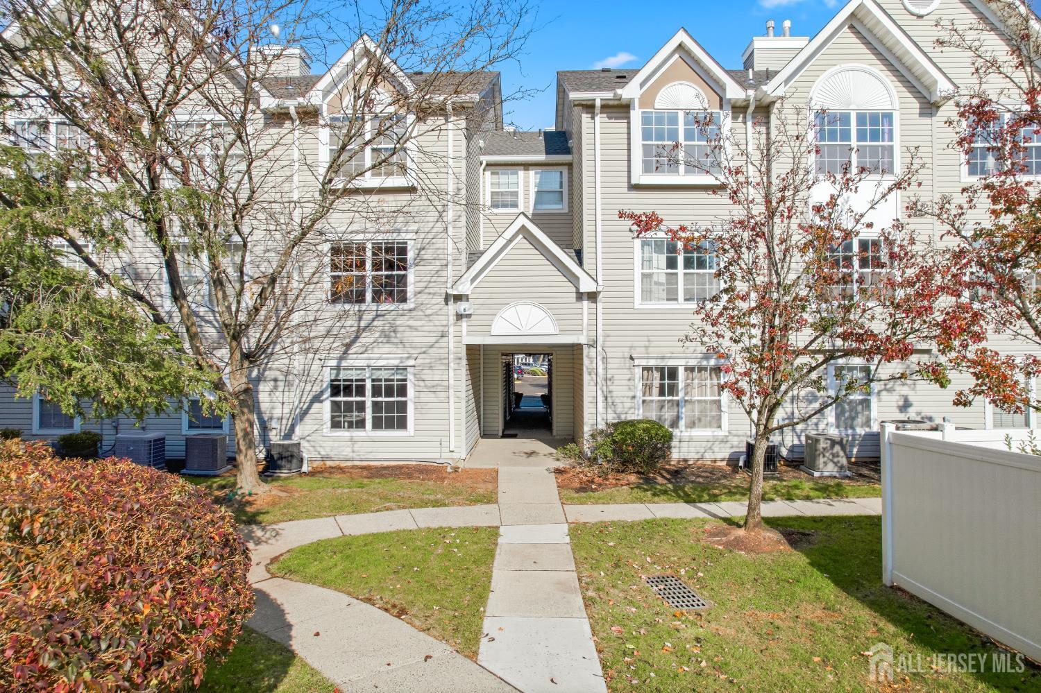 21 Newburgh Drive Edison, NJ 08820 - Photo 26 of 31 a front view of a house with garden