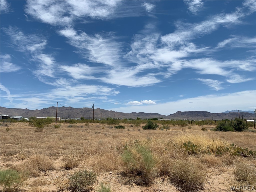 3468 Mobile Road Golden Valley, AZ 86413 - Photo 3 of 11 a view of lake with mountain