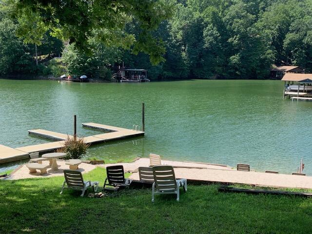 Lot 12 Gap Bridge Road Moneta, VA 24121 - Photo 11 of 14 a view of a lake with table and chairs