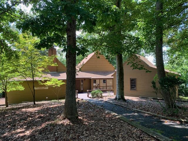Lot 12 Gap Bridge Road Moneta, VA 24121 - Photo 12 of 14 a front view of a house with garden