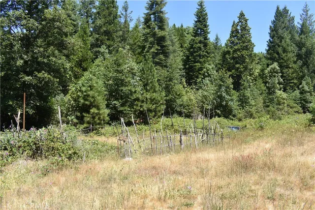 a view of lake with green space