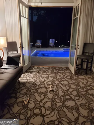 a view of a yard with outdoor seating