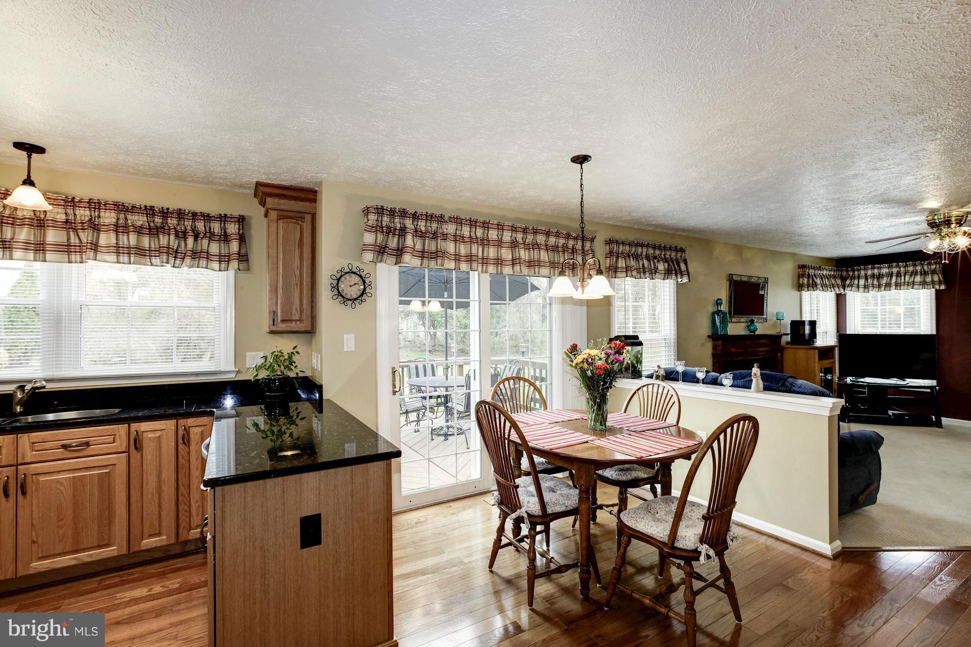 10403 Labrador Loop Manassas, VA 20112 - Photo 12 of 29 Open plan kitchen with Granite Countertops