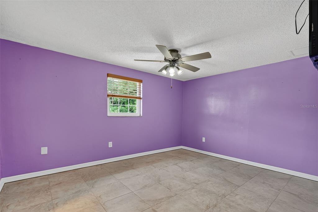 4301 Summersun Drive, Unit A New Port Richey, FL 34652 - Photo 23 of 35 an empty room with window
