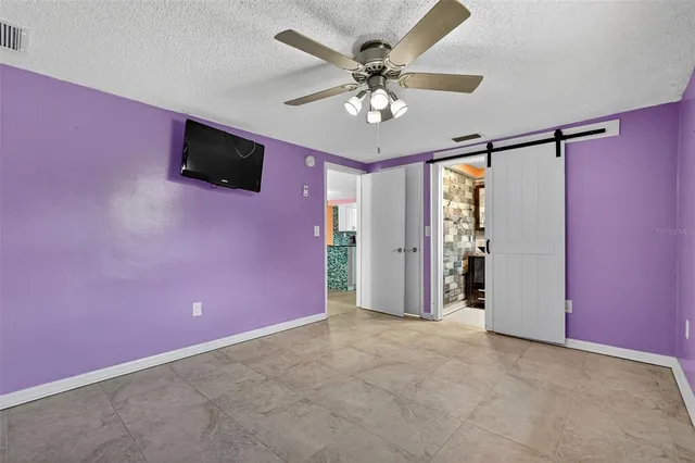 a bathroom with a toilet a sink and a shower