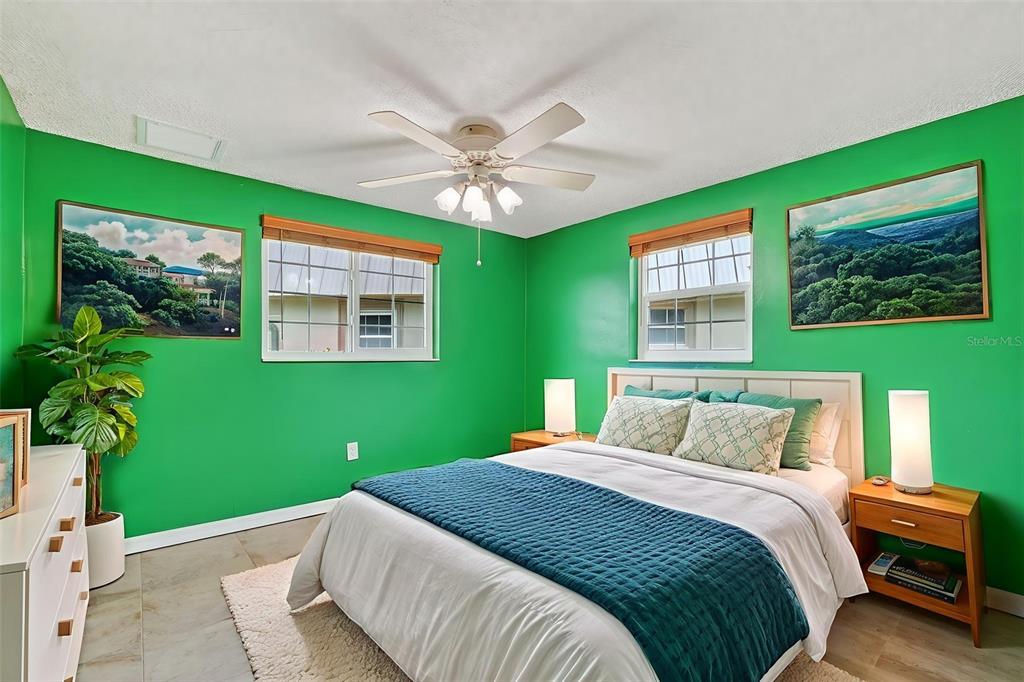 4301 Summersun Drive, Unit A New Port Richey, FL 34652 - Photo 30 of 35 a bedroom with a bed and a window