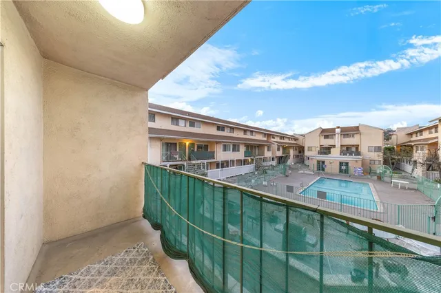 a view of a balcony with city view