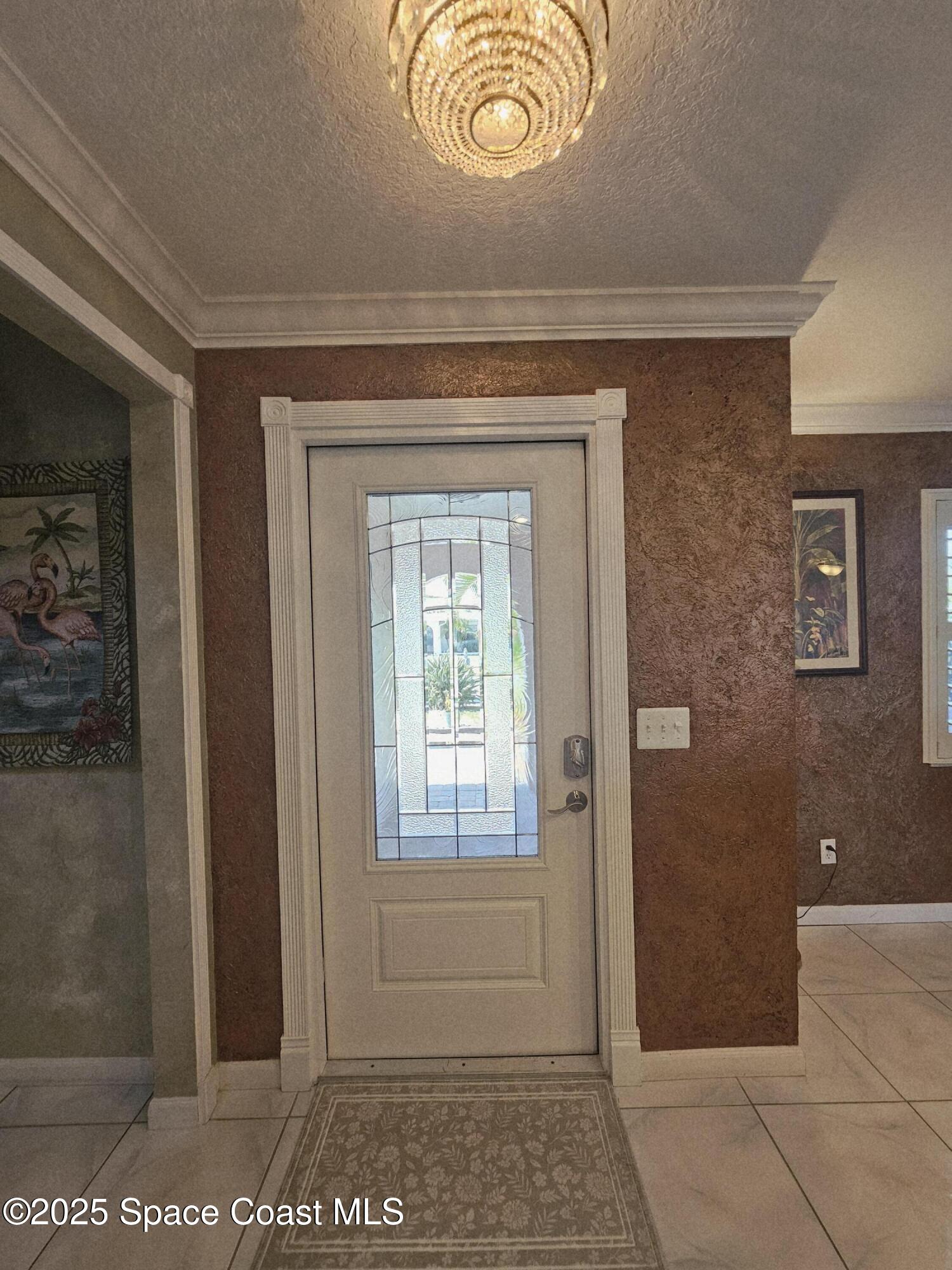 1525 West Riviera Drive Merritt Island, FL 32952 - Photo 27 of 47 a view of a hallway with entryway