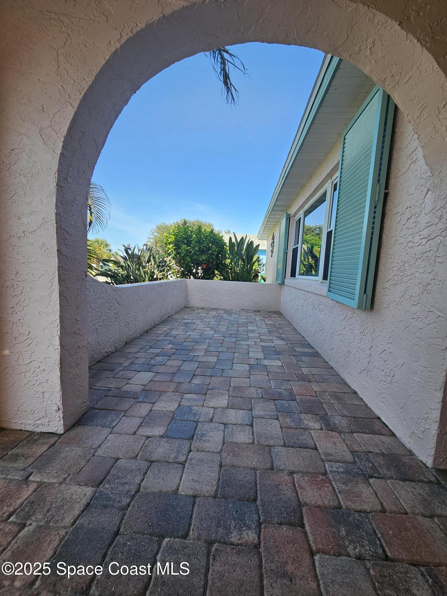 1525 West Riviera Drive Merritt Island, FL 32952 - Photo 10 of 47 a view of a backyard