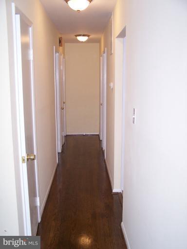 8908 Crandall Road Lanham, MD 20706 - Photo 12 of 30 1st Floor Hallway to bedrooms