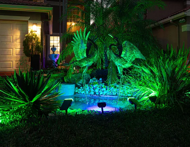 a living room with furniture a flat screen tv and a window