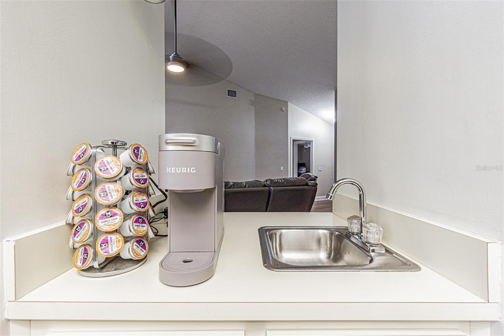7708 Merrily Way Lakeland, FL 33809 - Photo 18 of 41 a bathroom with a sink and mirror