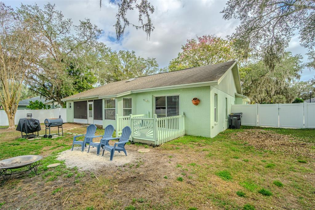7708 Merrily Way Lakeland, FL 33809 - Photo 36 of 41 a house view with a sitting space and garden
