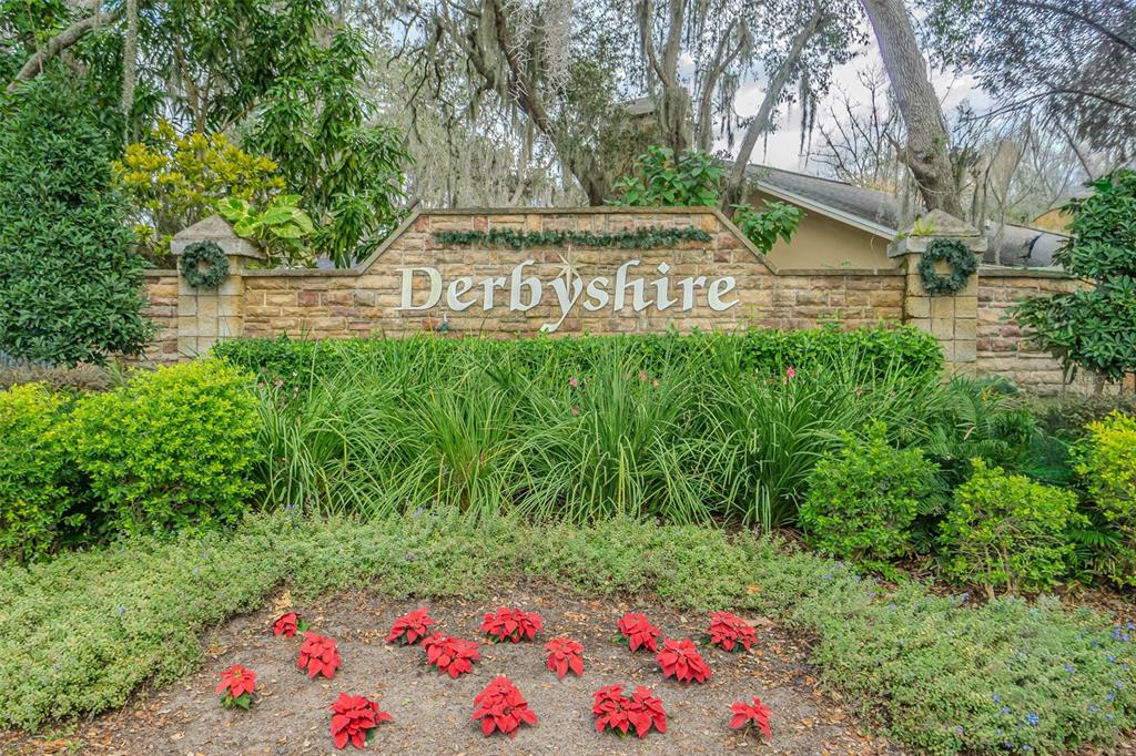 7708 Merrily Way Lakeland, FL 33809 - Photo 41 of 41 a sign that is sitting in front of flowers
