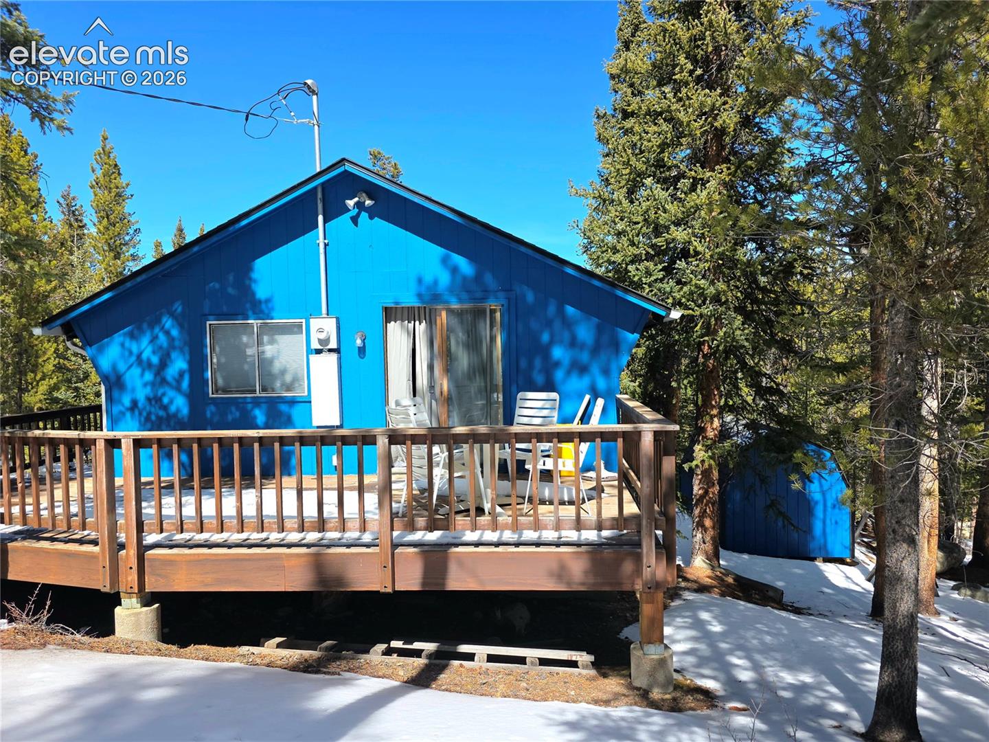 211 Pine Ridge Road Alma, CO 80420 - Photo 29 of 36 Back deck wraps around to the front entry on the upper level