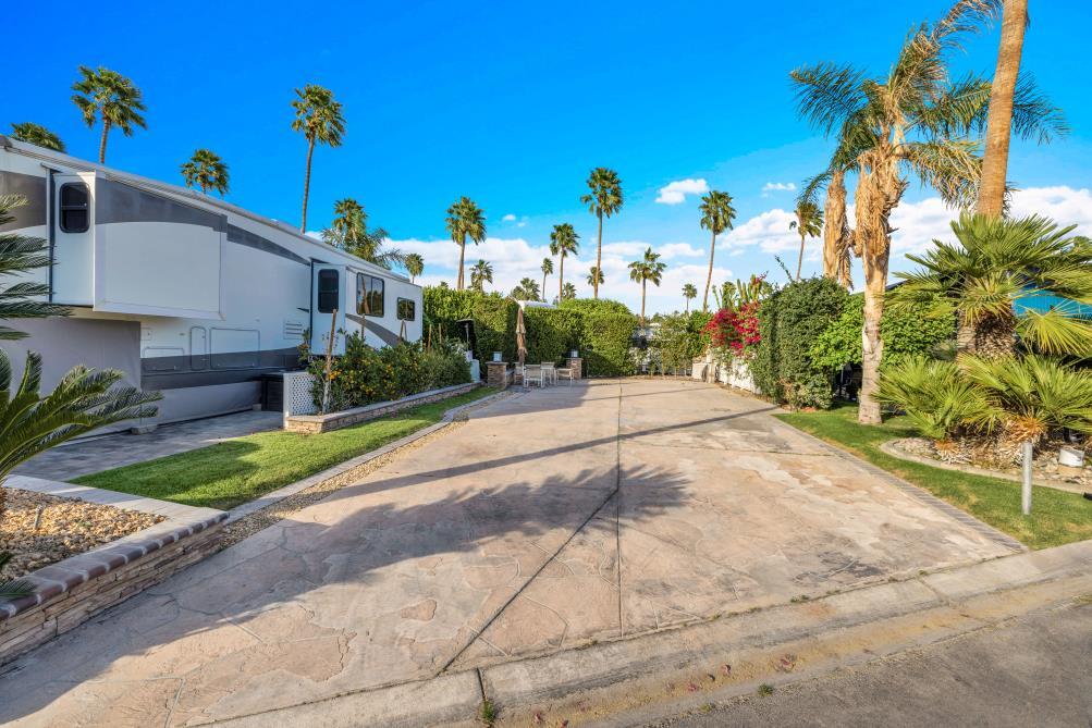 69411 Ramon Road, Unit 362 Cathedral City, CA 92234 - Photo 7 of 13 a view of a street with a building in the background
