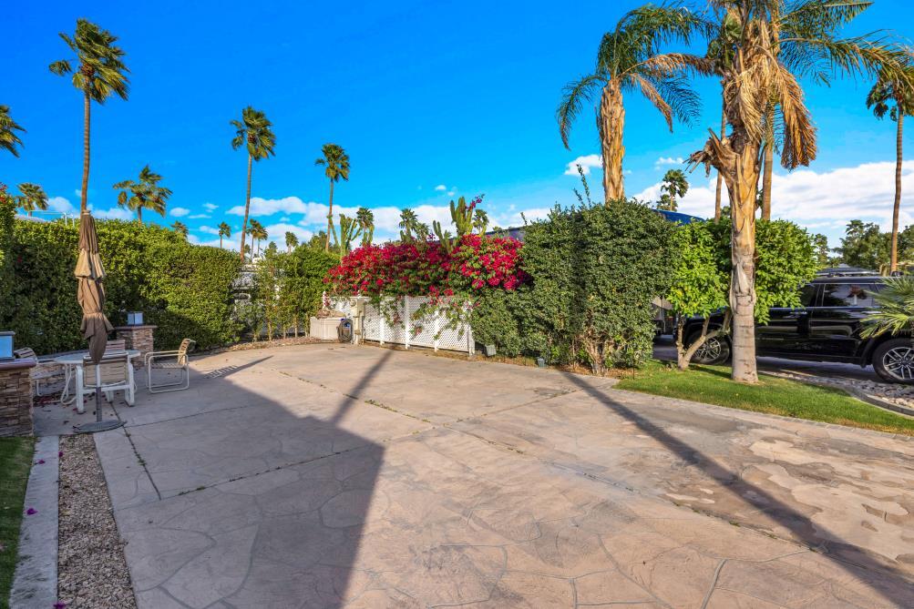 69411 Ramon Road, Unit 362 Cathedral City, CA 92234 - Photo 9 of 13 a view of a street with a building in the background