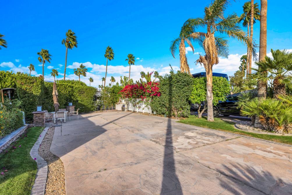 69411 Ramon Road, Unit 362 Cathedral City, CA 92234 - Photo 10 of 13 a view of a street with a building in the background