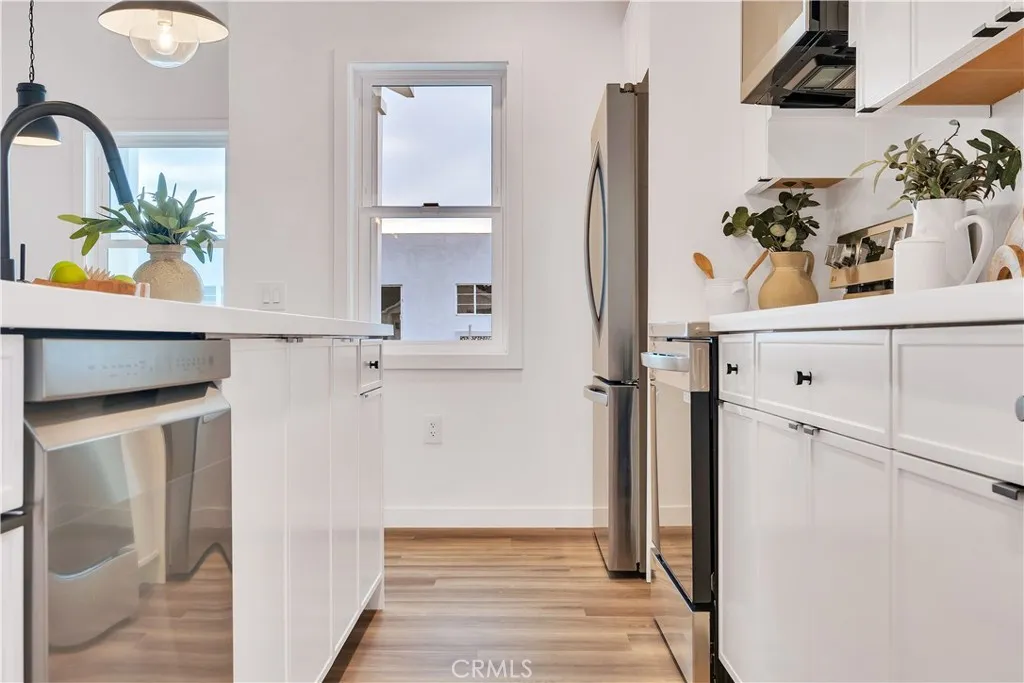 226 Arena Street El Segundo, CA 90245 - Photo 28 of 47 a view of hallway with wooden floor