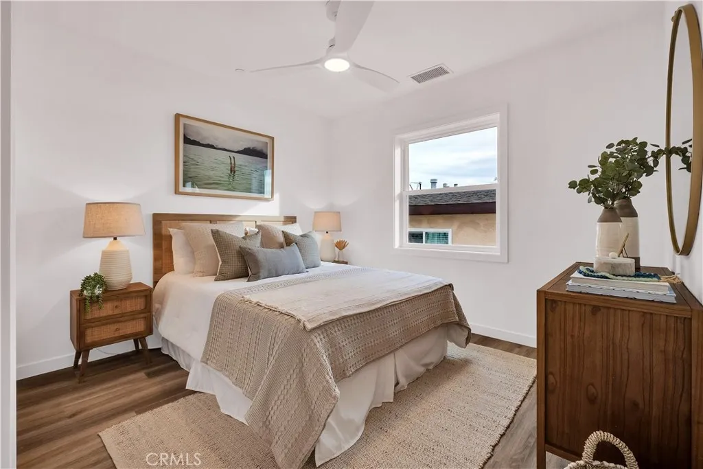 226 Arena Street El Segundo, CA 90245 - Photo 35 of 47 a bedroom with bed and a painting