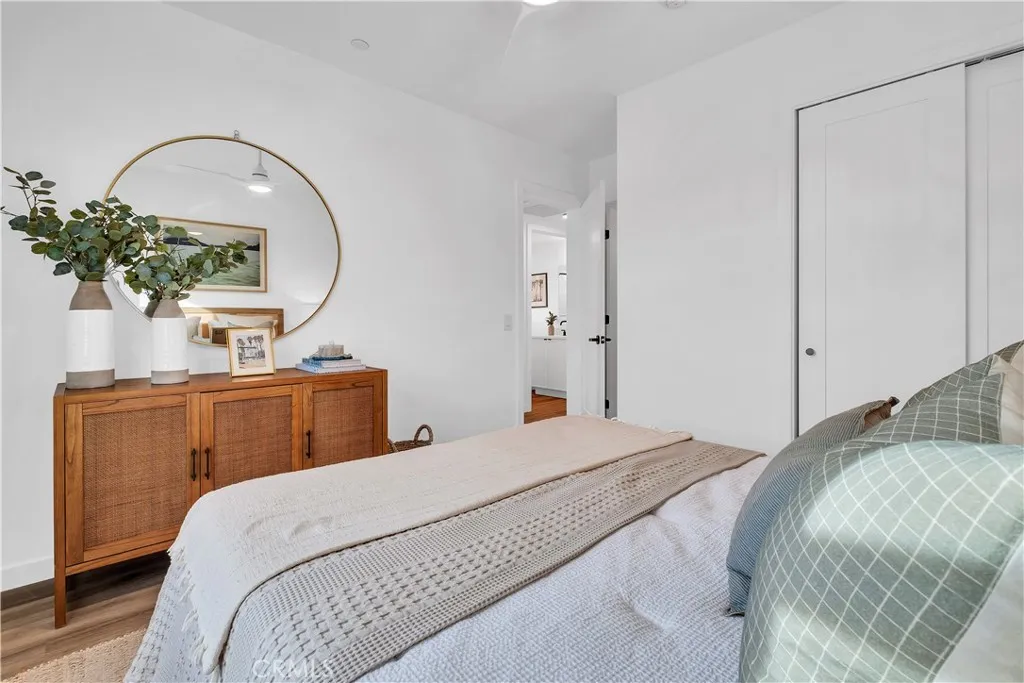 226 Arena Street El Segundo, CA 90245 - Photo 41 of 47 a bedroom with a bed and a mirror