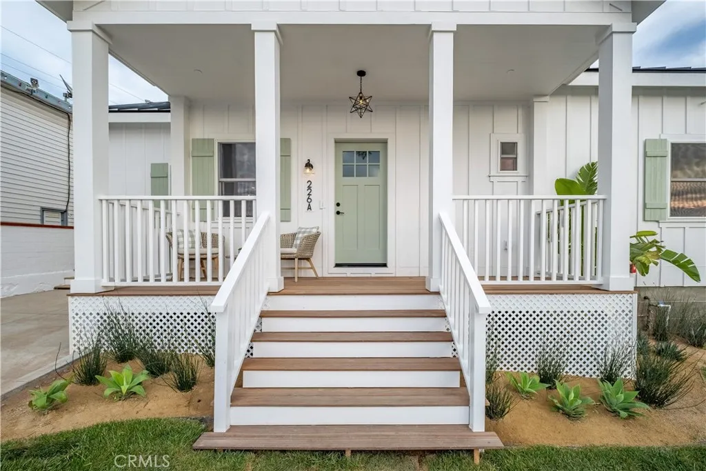 226 Arena Street El Segundo, CA 90245 - Photo 10 of 47 a front view of a house with a garden